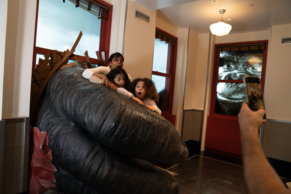 A family in the Kong exhibit